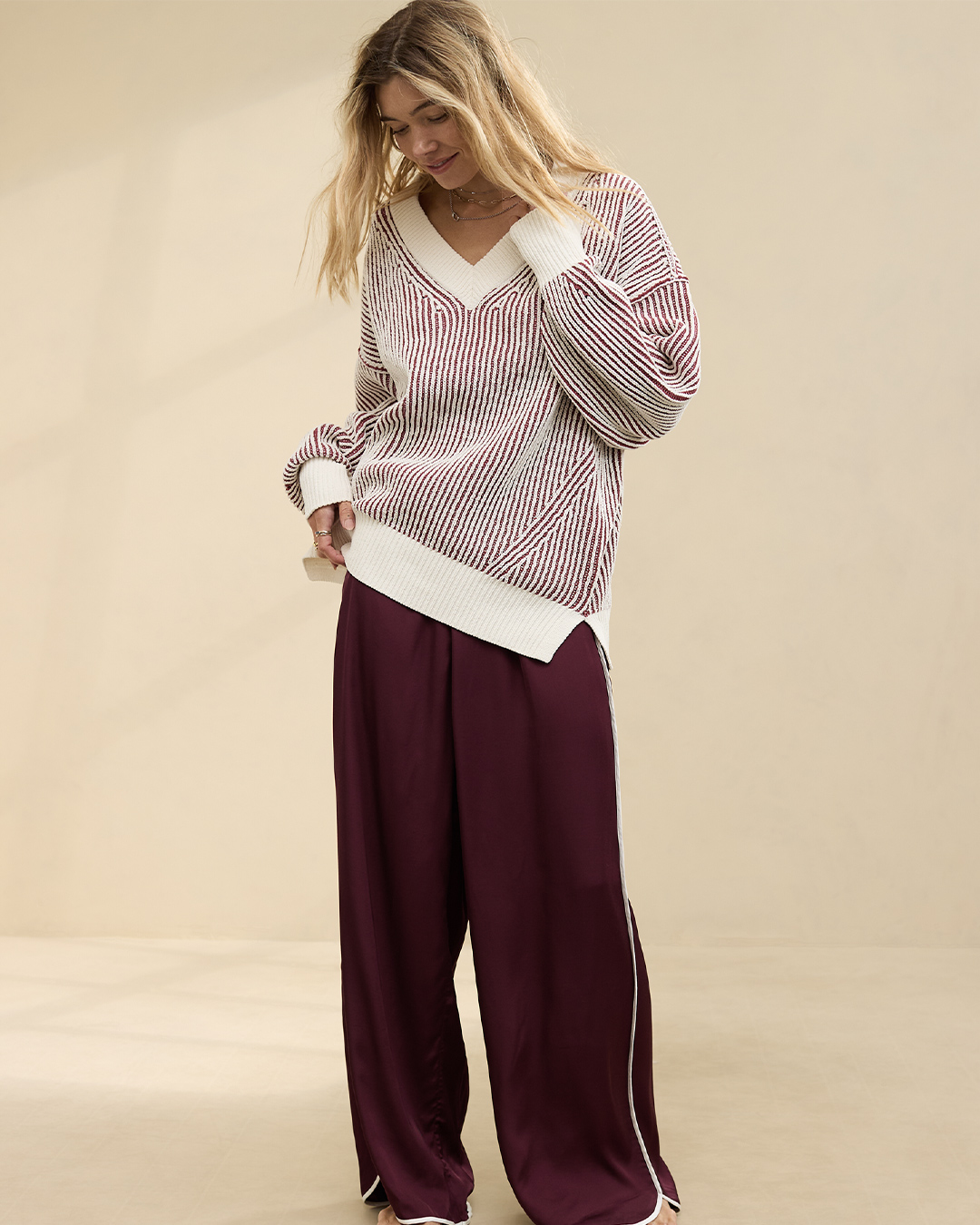 woman wearing sweater outfit 