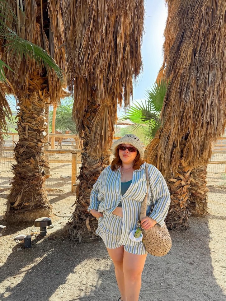 Woman wearing Aerie top and shorts.
