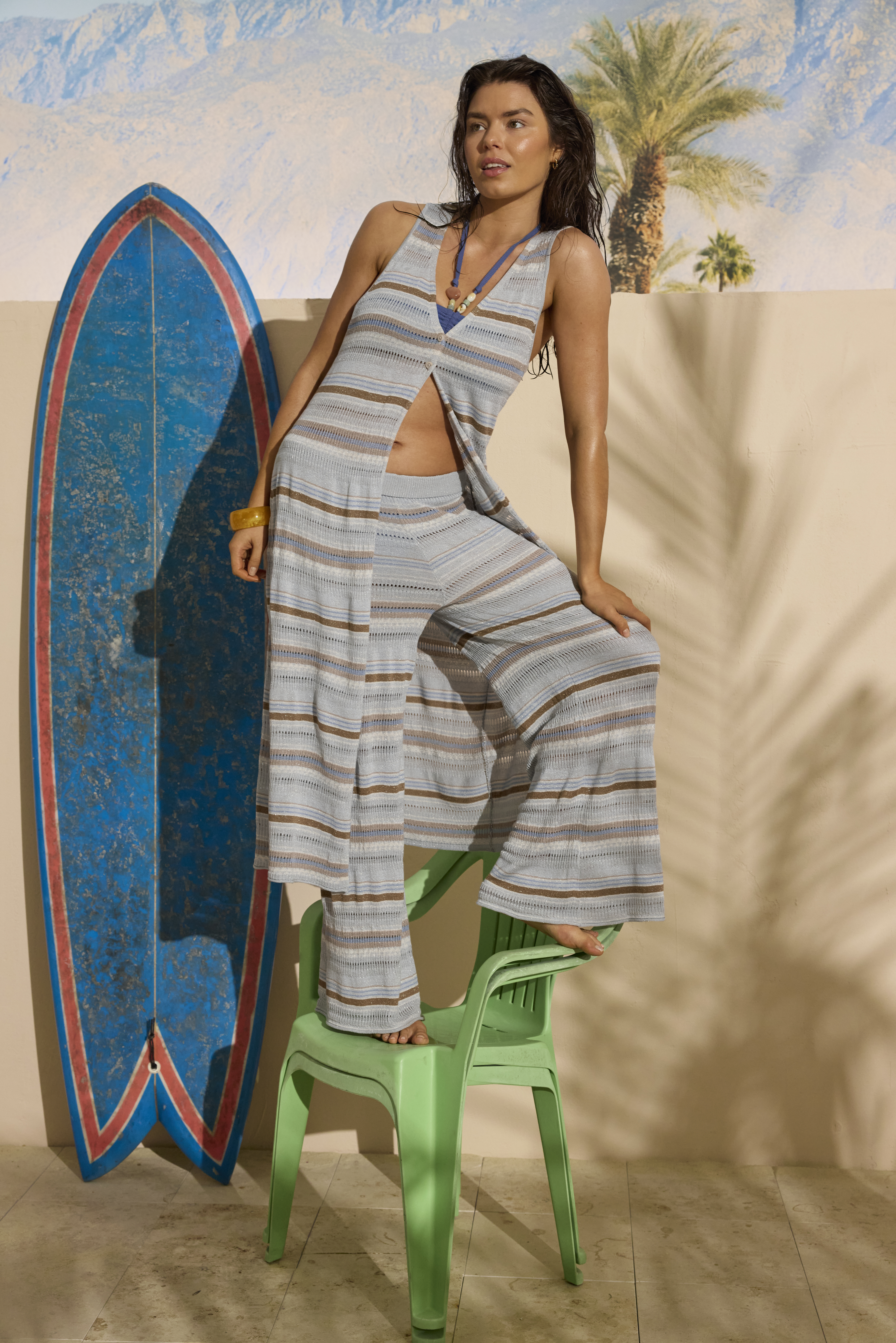 Woman wearing blue striped Aerie matching set.