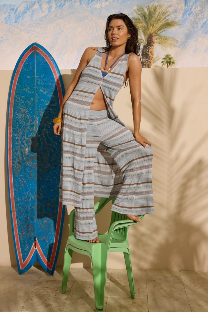 Woman wearing blue striped Aerie matching set.