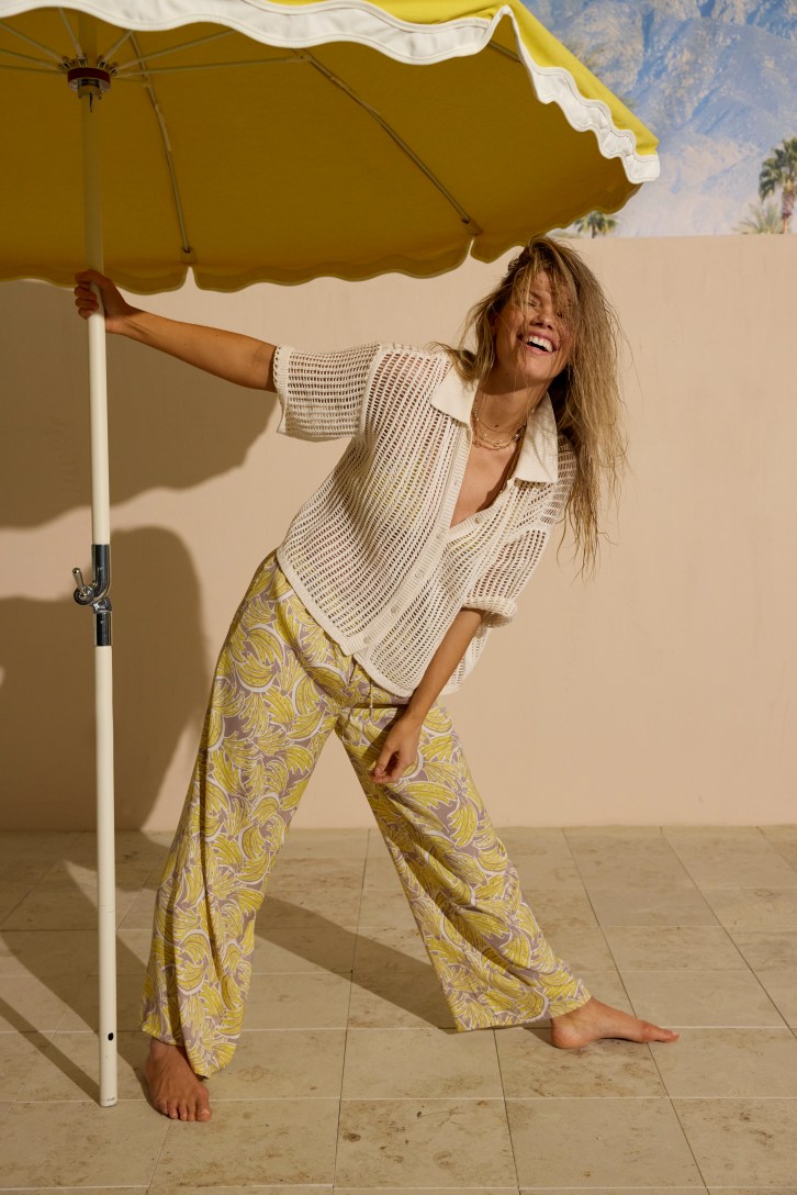 Woman wearing loose summer clothing.