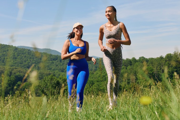 Women running in OFFLINE by Aerie activewear.