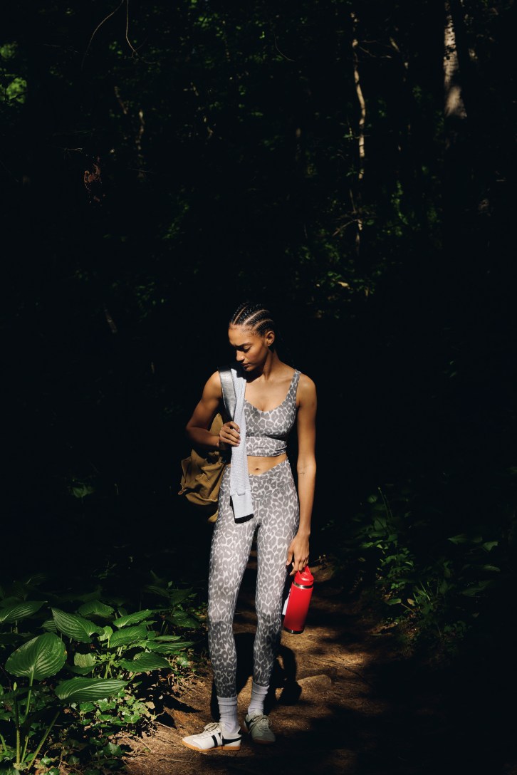 Woman hiking in leggings.