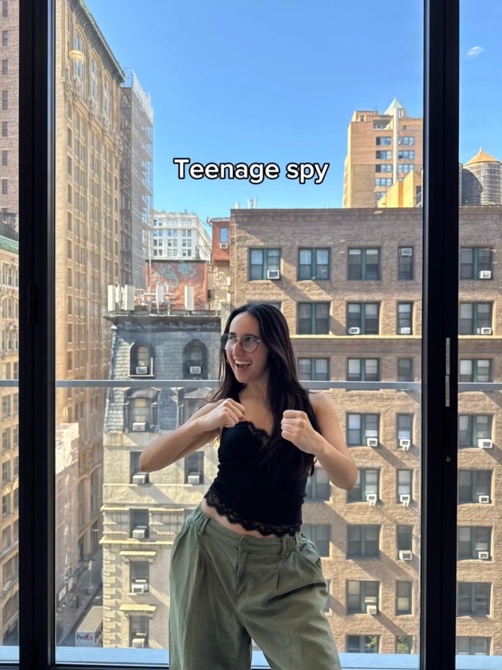 Woman wearing Aerie pieces as a teen spy costume.